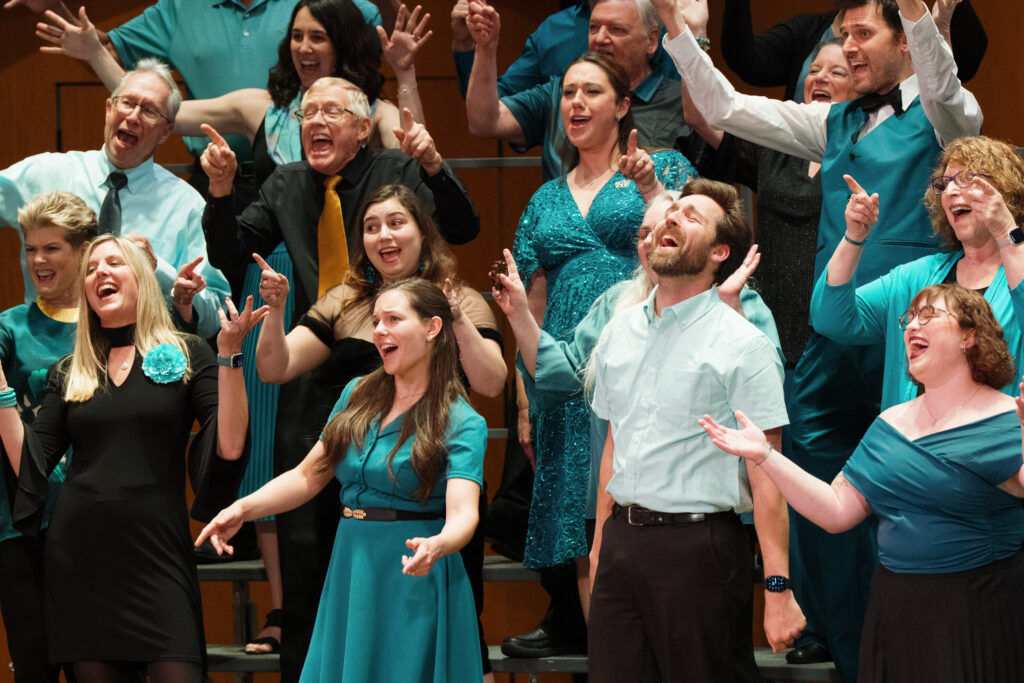 AACC chorus performing on stage